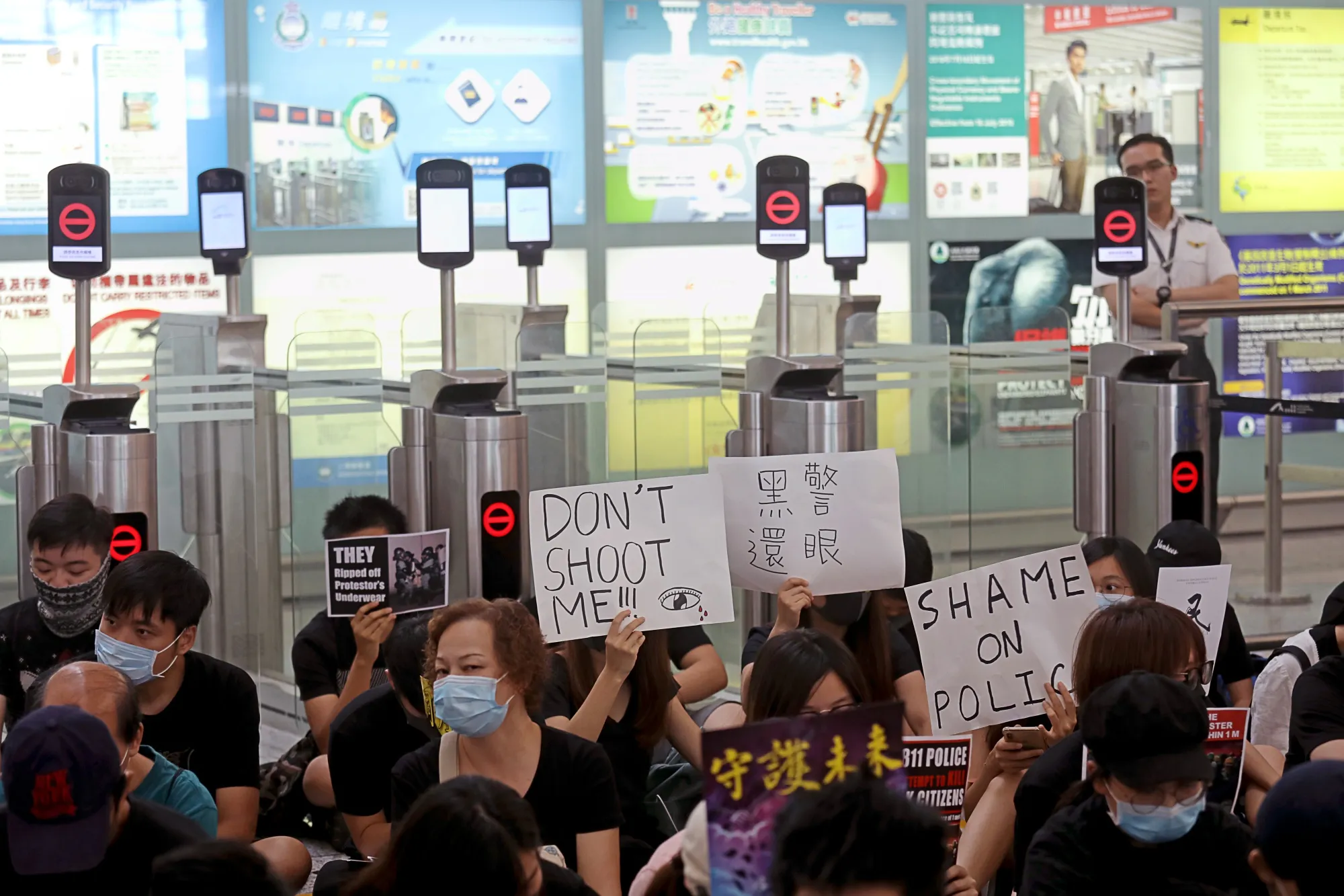 Demonstrators during a protest at Hong Kong International Airport, Aug. 13.&nbsp;