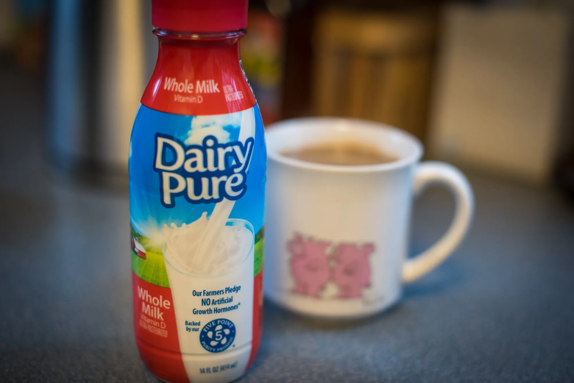 A container of Dean Foods Co. Dairy Pure brand whole milk
