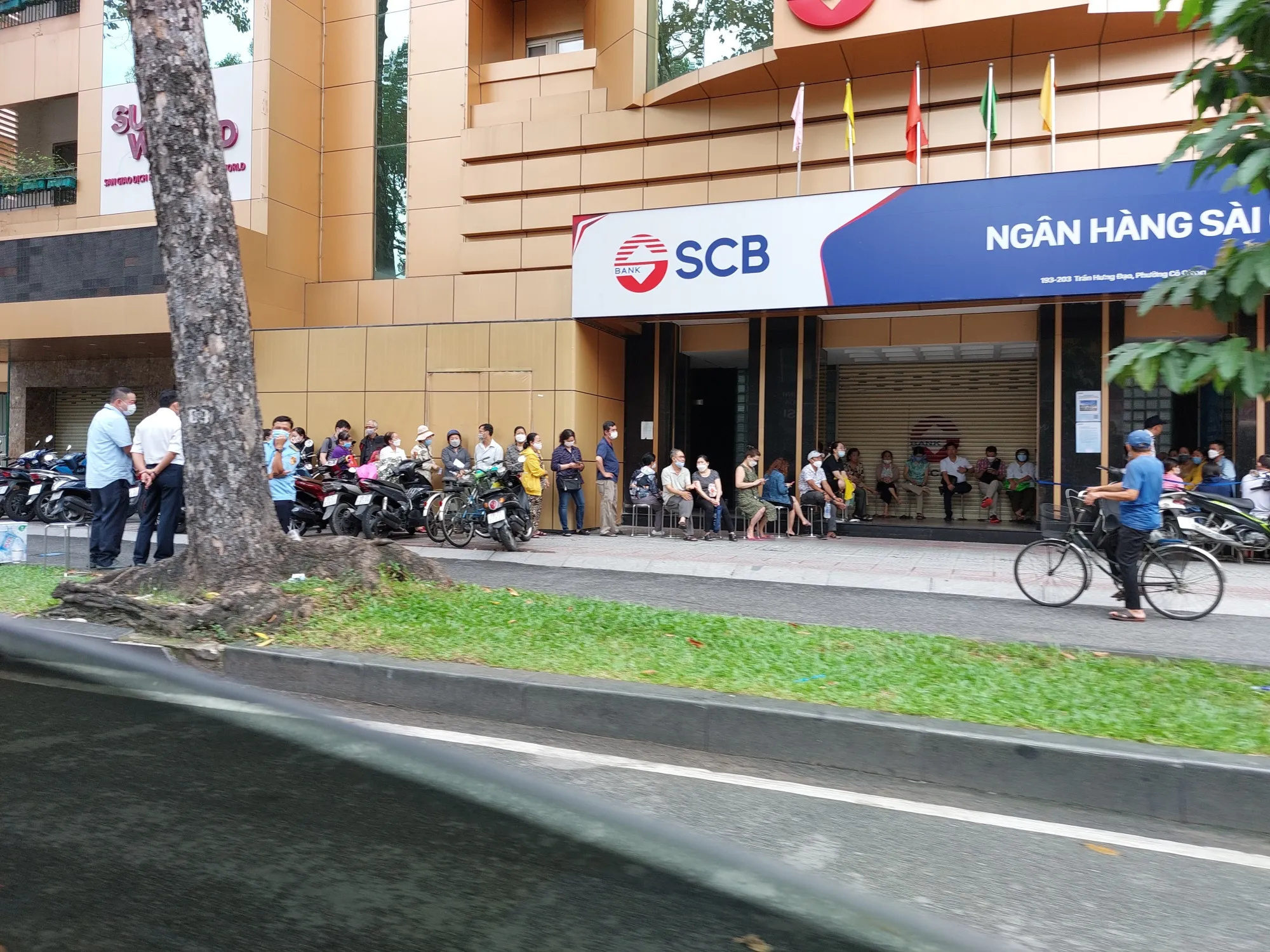 Customers line up at a Saigon Commercial Bank branch in Ho Chi Minh City on Oct. 10.