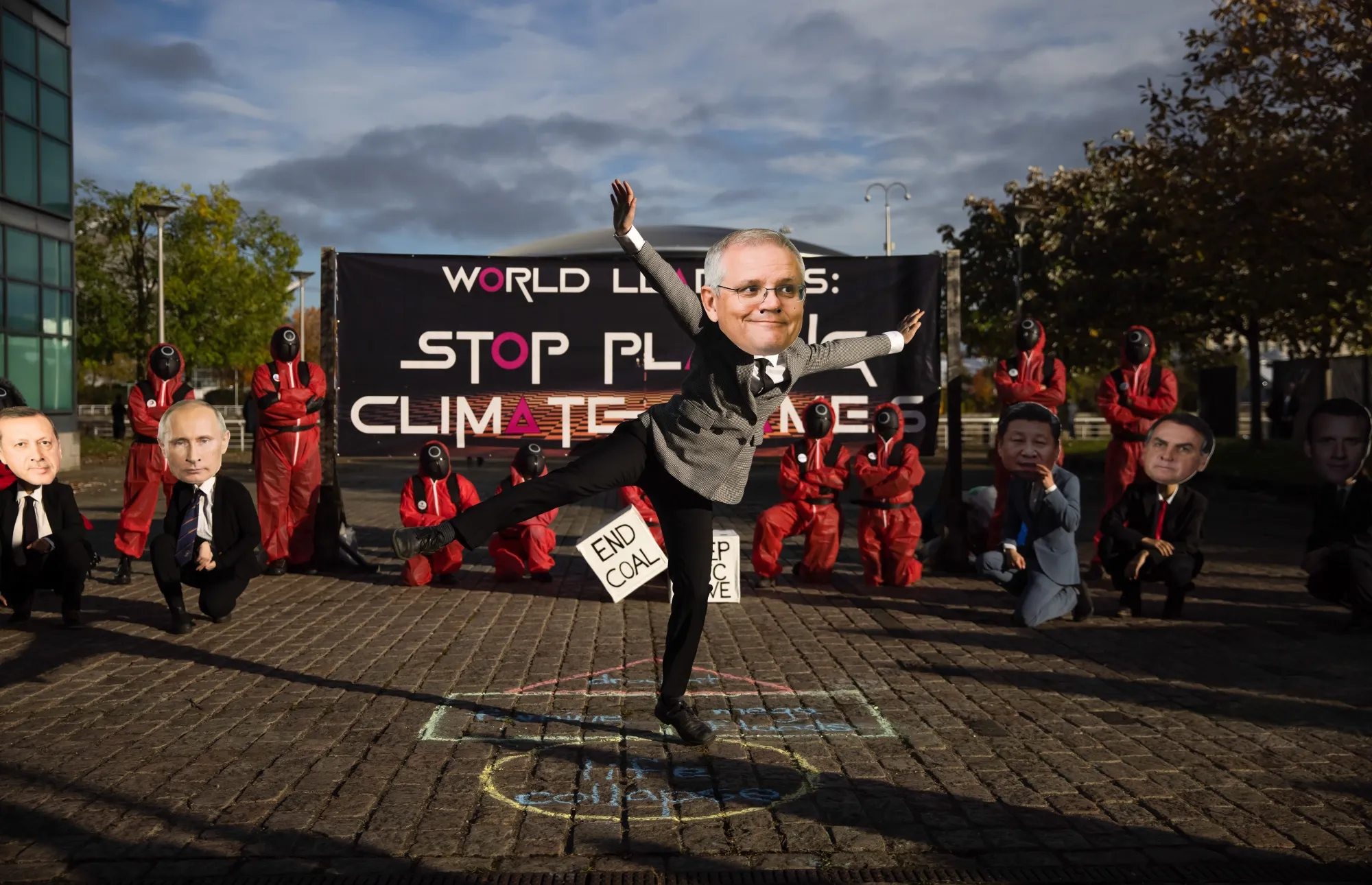 A climate-change activist wearing a mask depicting Australia's Prime Minister Scott Morrison during the COP26 climate talks in Glasgow, U.K.