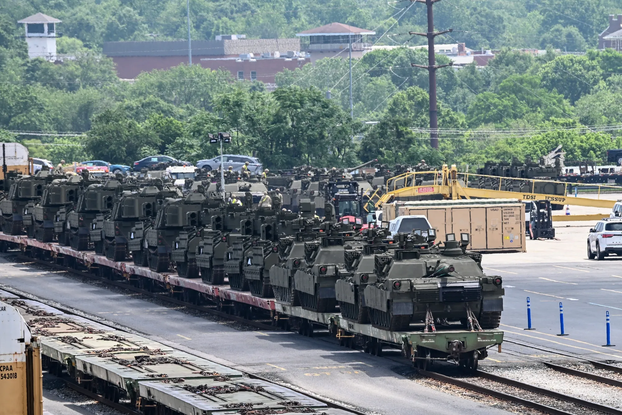 
Rail cars carrying long lines of tanks arrive in Jessup, Maryland, June 9, 2025, in advance of Saturday’s military parade.
