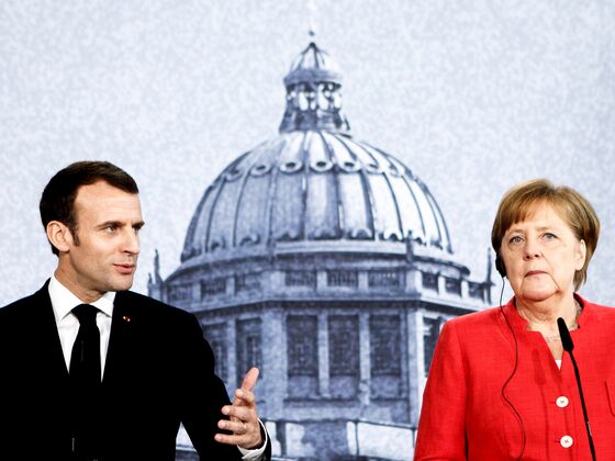 Merkel's Furious Allies Vow to Stop Macron's EU Power Grab