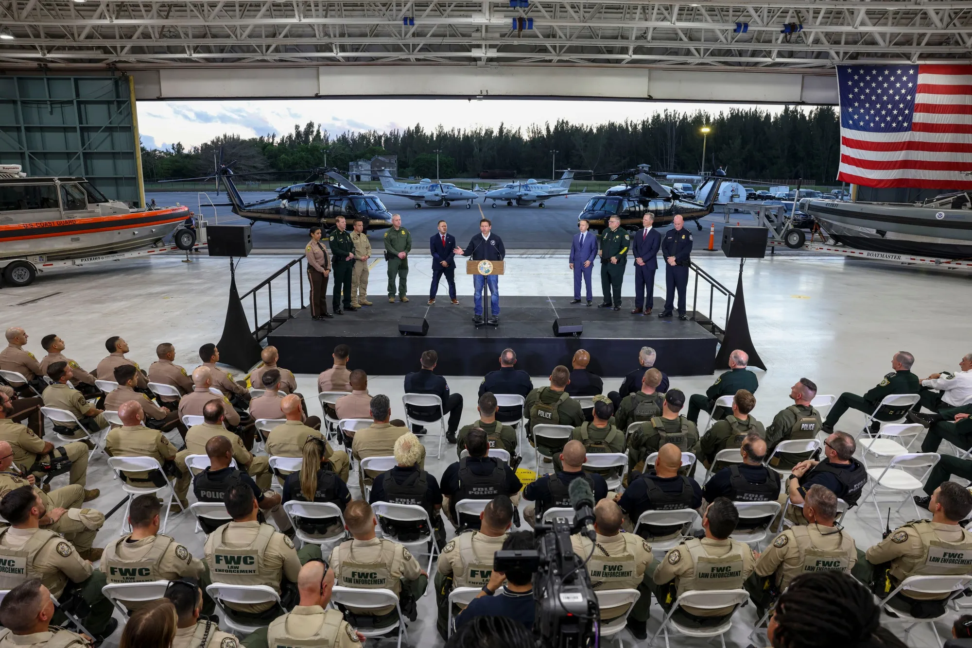 Florida Governor Ron DeSantis speaks to local and state law enforcement&nbsp;officers&nbsp;during a news conference on border security at Homestead Air Force Base in Homestead in February.