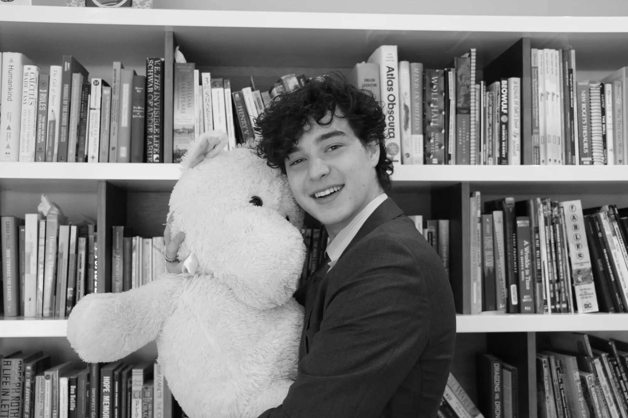 Meir Straus, 18, poses with a stuffed animal&nbsp;toward the end of his campaign for the Jun 26 mayoral election.