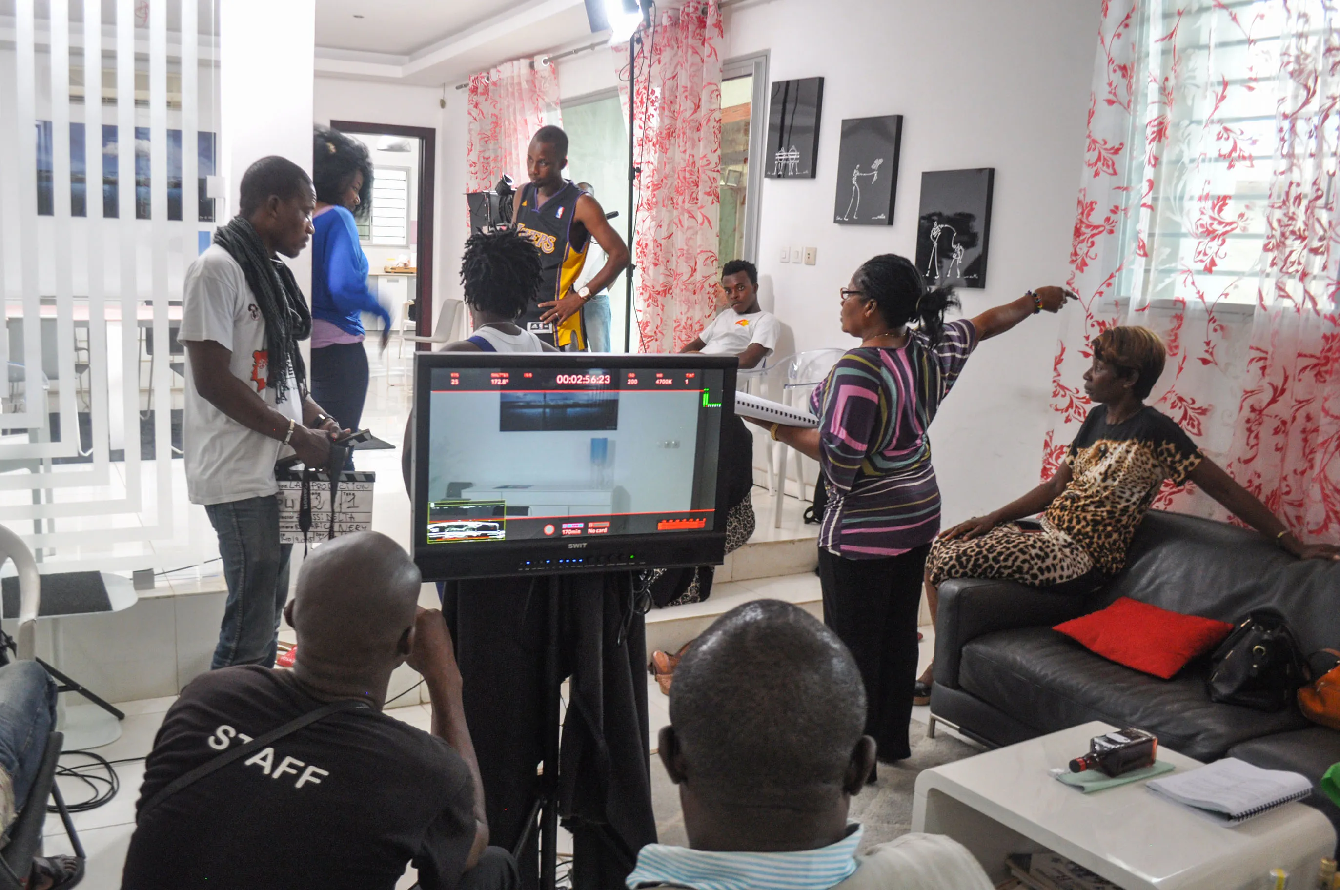 A crew films scenes for the Canal+ television series ’Ma Grande Famille’ in Abidjan.