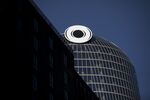 The Macquarie Group Ltd. logo atop the company's headquarters in Sydney. Photographer: Brent Lewin/Bloomberg