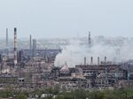 Smoke rises from thegiant Azovstal steel mill in Mariupol in May.