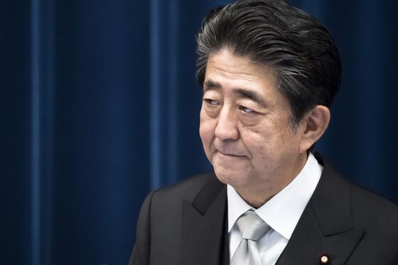 Japan’s Abe Rolls the Dice on His Political Legacy With Tax Hike