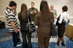 Job seekers at a National Career Fairs job fair in San Diego, California