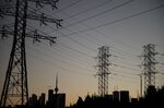Hydro towers at dusk in Toronto.