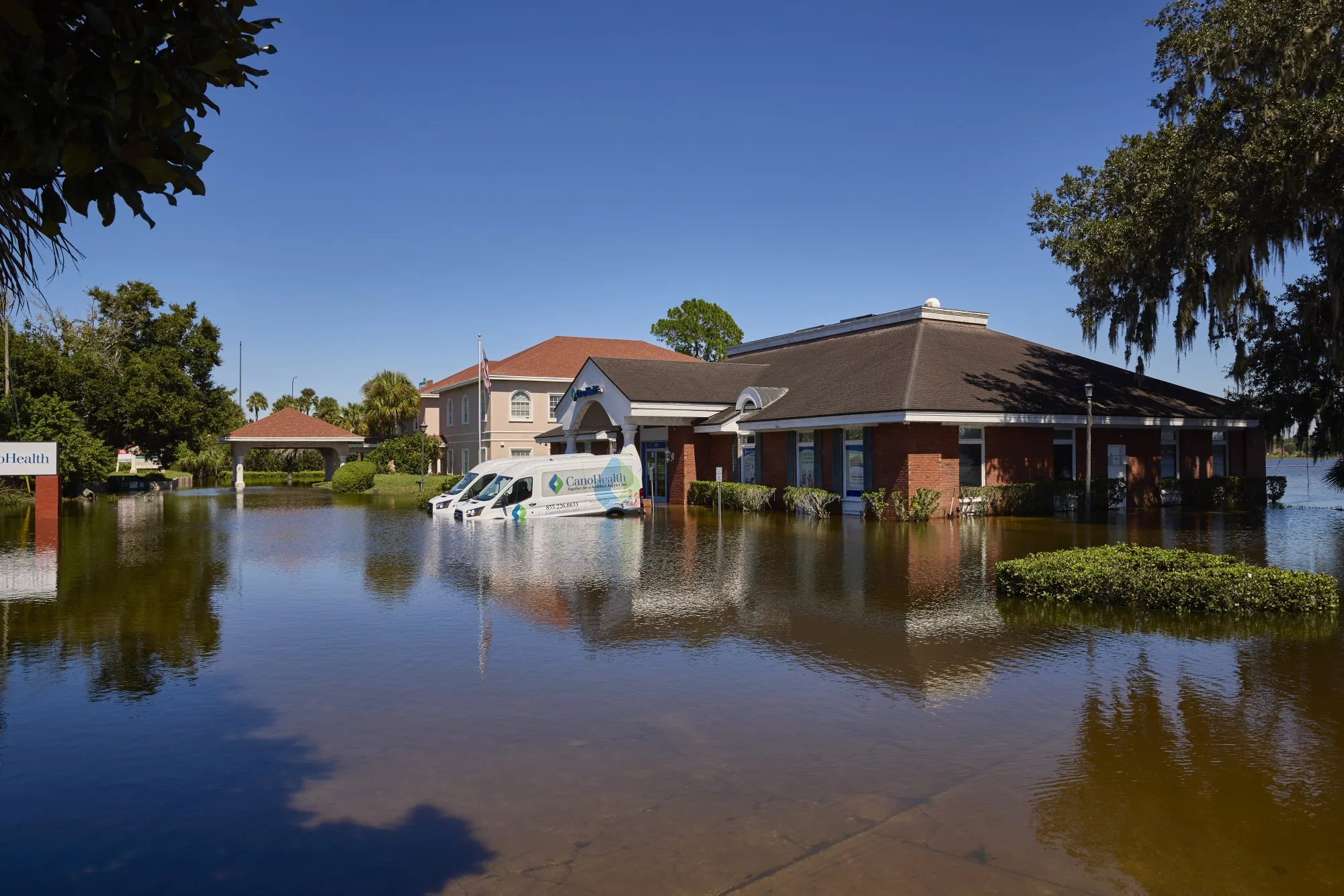 A Cano Health medical center submerged in water in a flooded neighborhood following Hurricane Ian in Orlando, Florida, in September 2022.