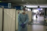 A medic at a PCR testing area inside Athens International Airport on Sept. 17.