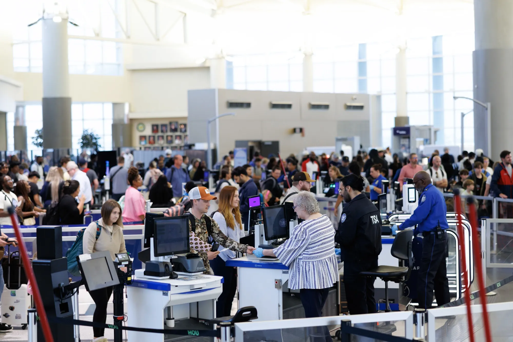 Travelers wait in line at a Transportation Security Administration (TSA) checkpoint at William P. Hobby Airport in Houston, Texas,&nbsp;on&nbsp;March 9.