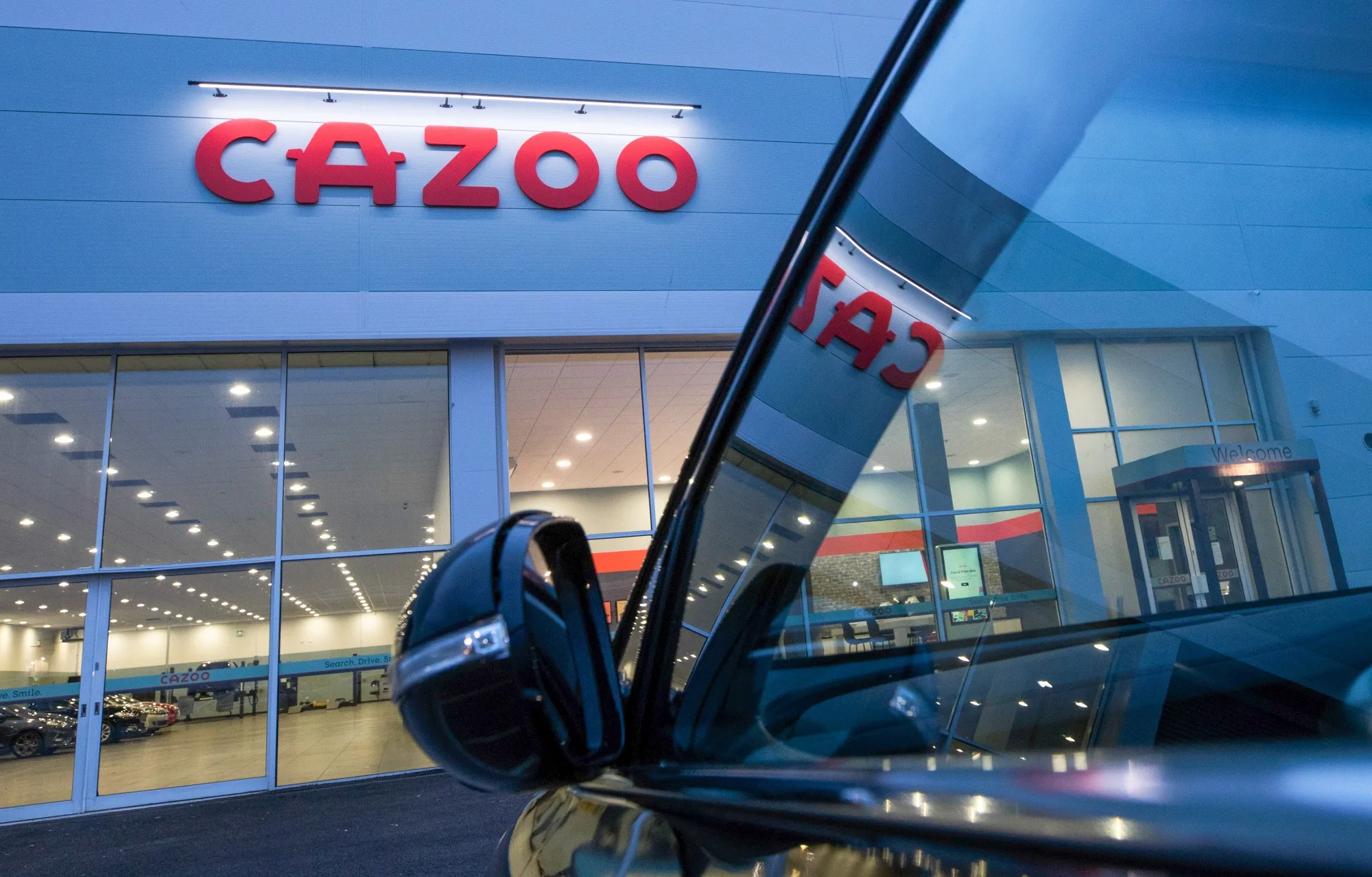 A sign above the Cazoo Ltd. customer centre in Southampton, U.K.
