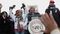 Samaira Rice, the mother of Tamir Rice; Lesley McSpadden, the mother of Michael Brown Jr; Rev. Al Sharpton and Michael Brown Sr., the father of Michael Brown Jr, raise their hands in the air during the 'Justice For All' march and rally through the nation's capital December 13, 2014 in Washington, DC.