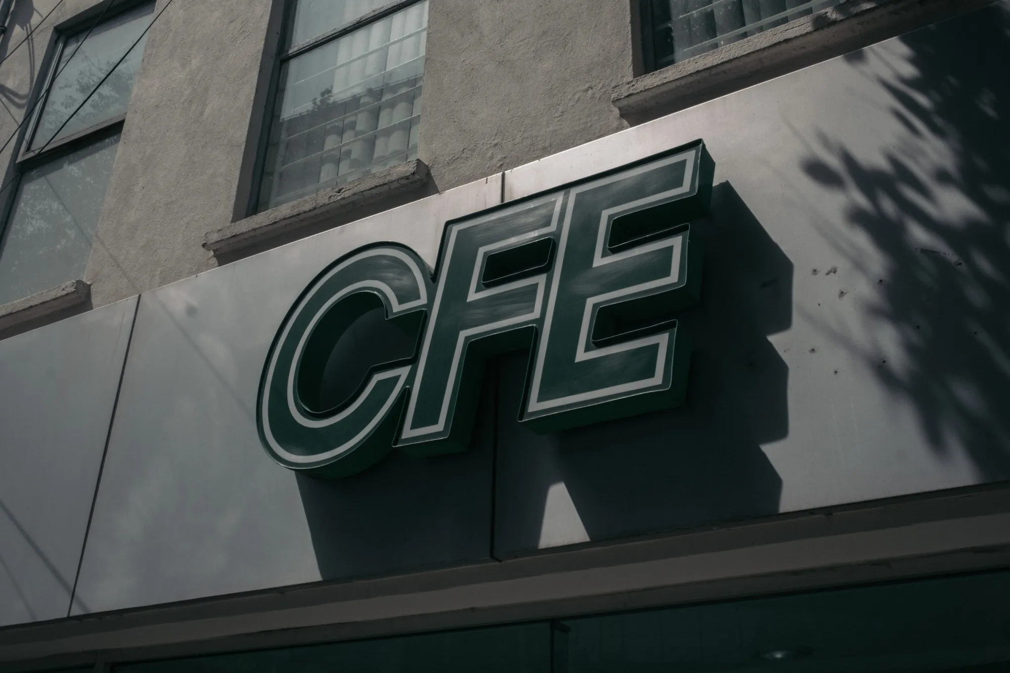 Signage outside a Comision Federal de Electricidad (CFE) self-service automated payment kiosk center in Mexico City, Mexico, on Wednesday, April 13, 2022. President Andres Manuel Lopez Obrador failed in his effort to restore state control of Mexico's electricity sector, handing the nationalist leader an unusual political defeat in his fight against private energy producers.