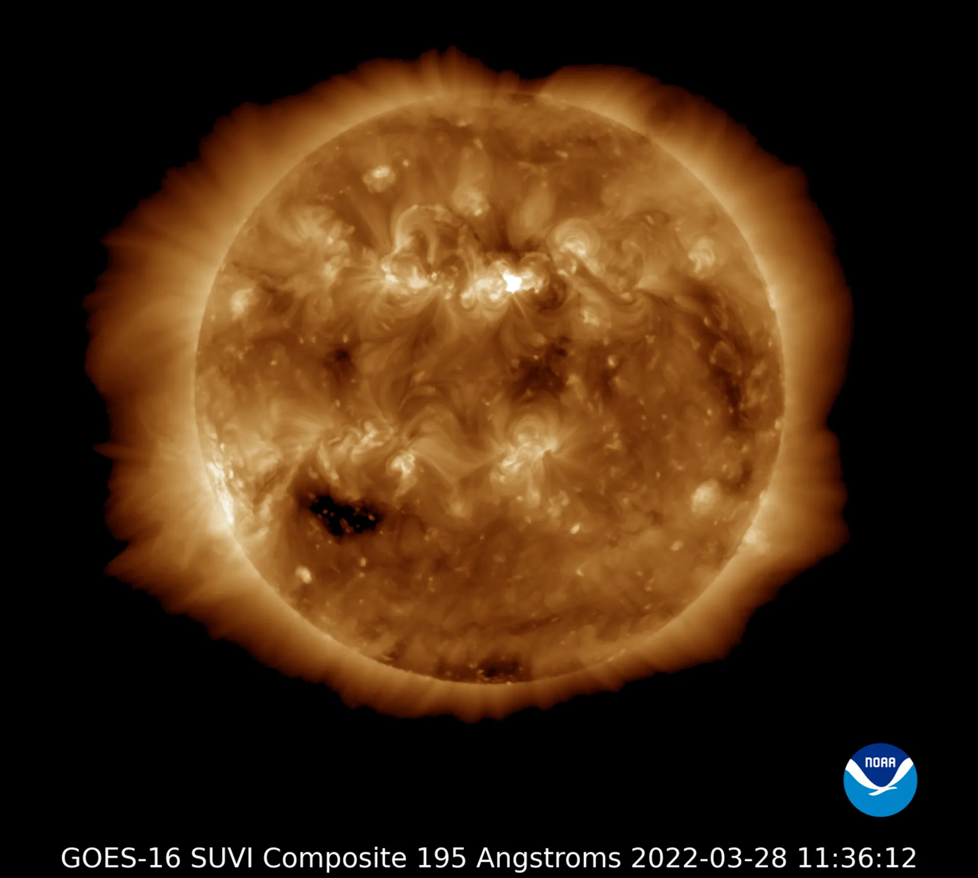 A satellite captured a solar flare --&nbsp;the white area near the top and center -- that happened March 28.