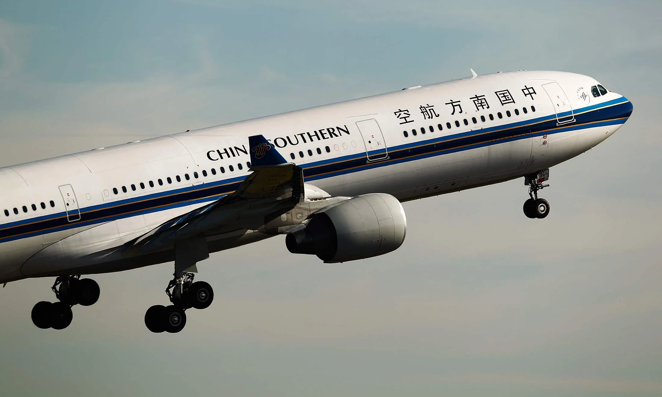 A China Southern Airlines Co. aircraft takes off at Sydney Airport in Sydney, Australia, on Monday, June 22, 2015.
