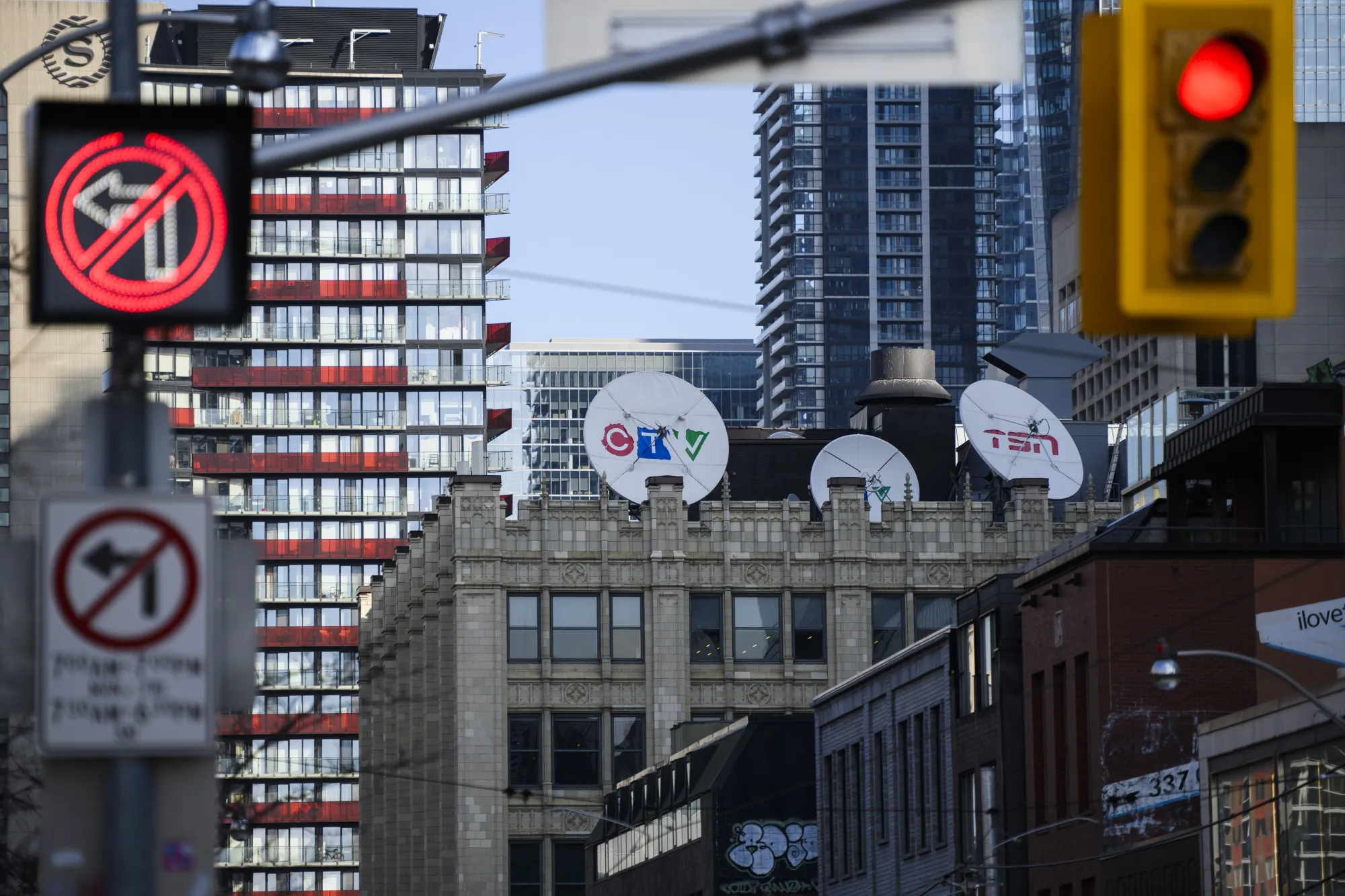 Satellite dishes on top of a building in Toronto, Ontario.