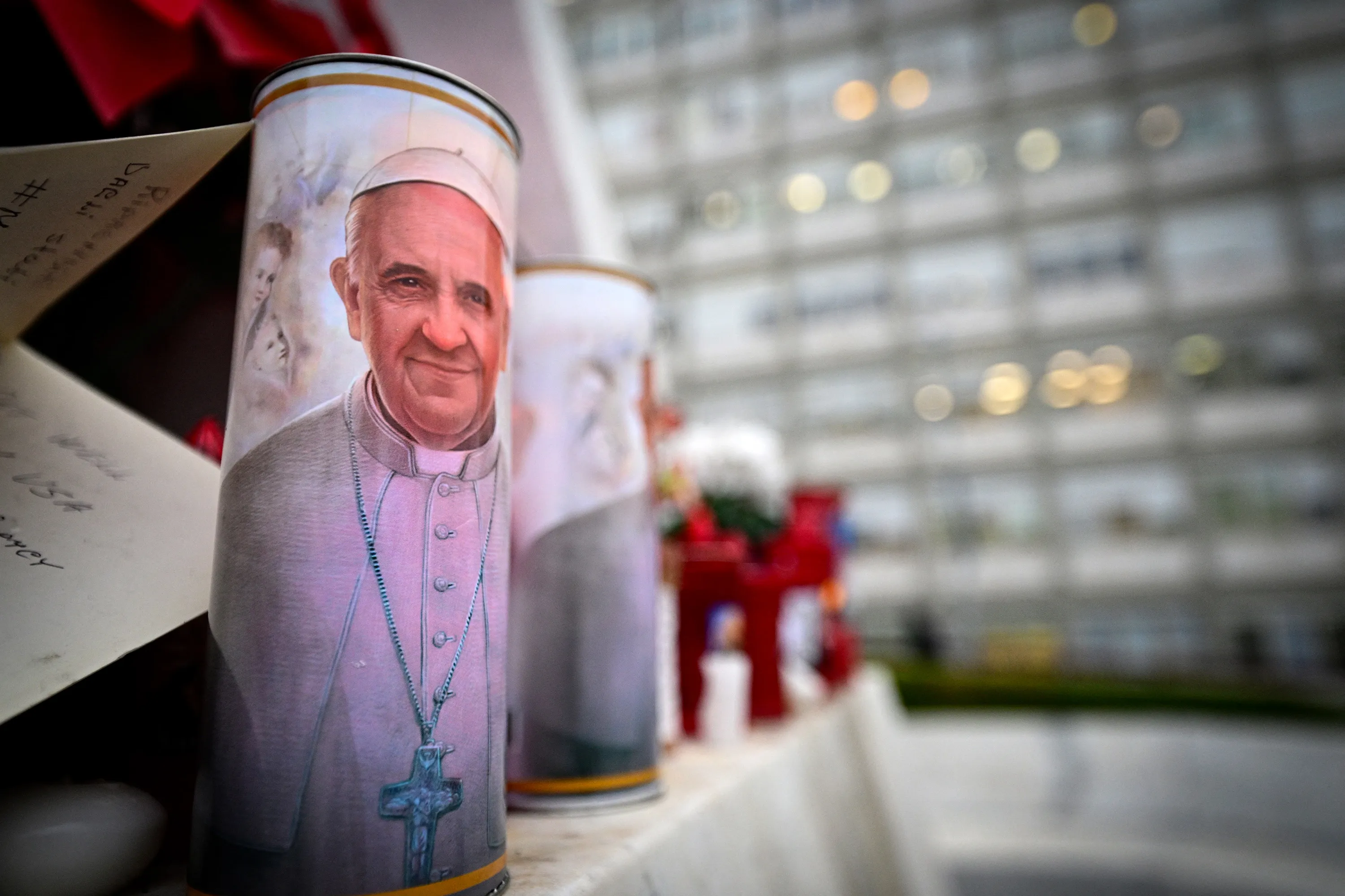A candle outside the Gemelli hospital where Pope Francis is hospitalized for tests and treatment for bronchitis in Rome, on February 19, 2025.