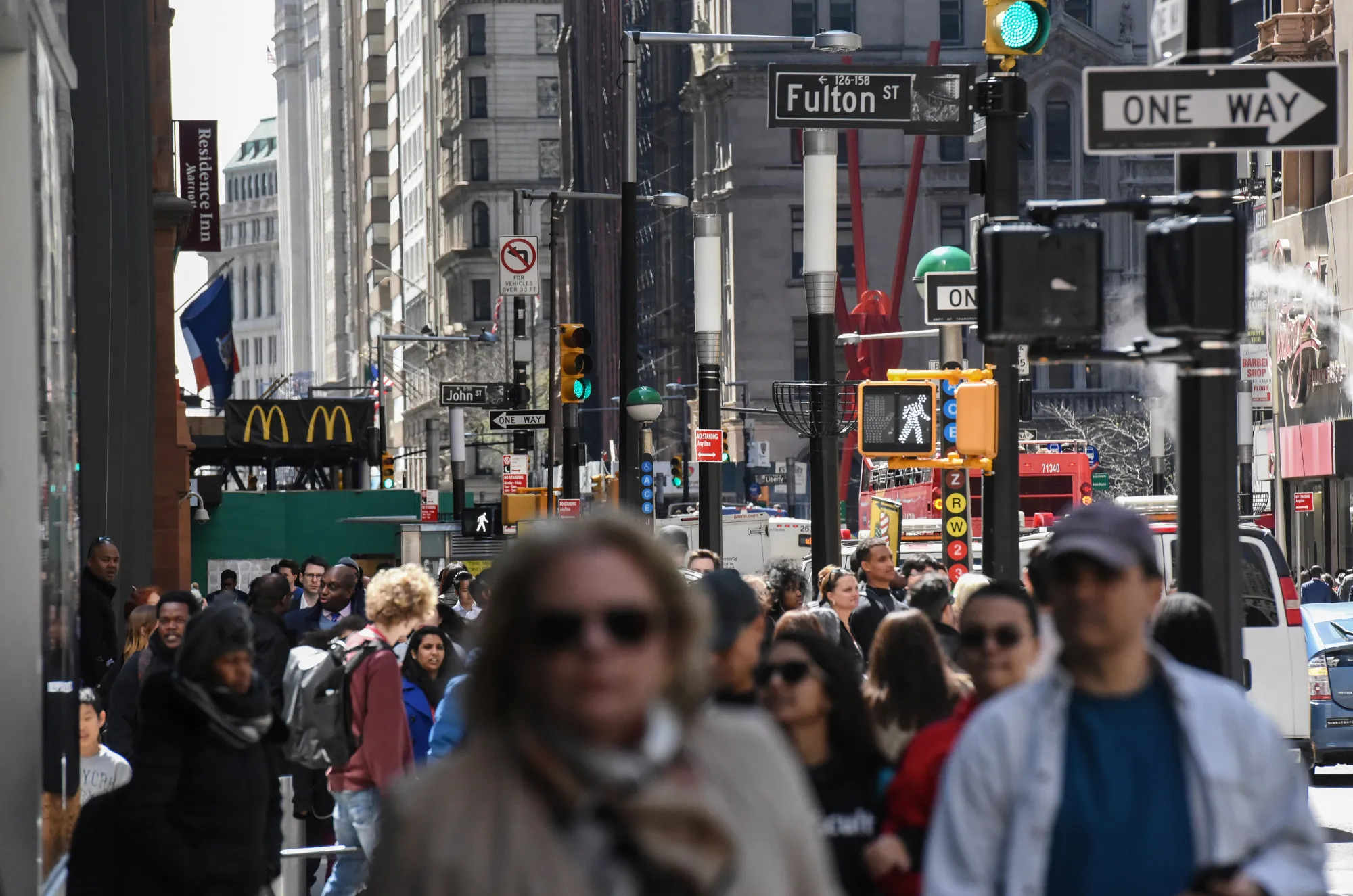Pedestrians and shoppers walk in New York.&nbsp;