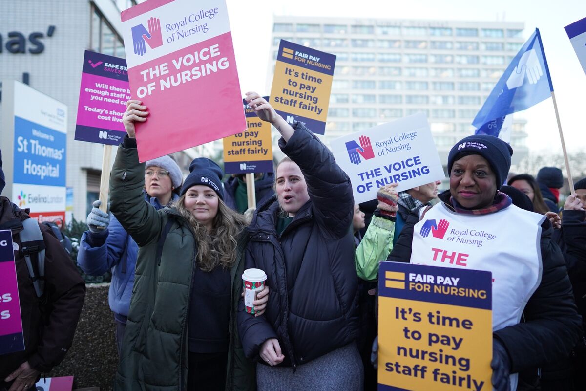 Striking hospital workers turn up at RMT rally in show of support for rail  staff