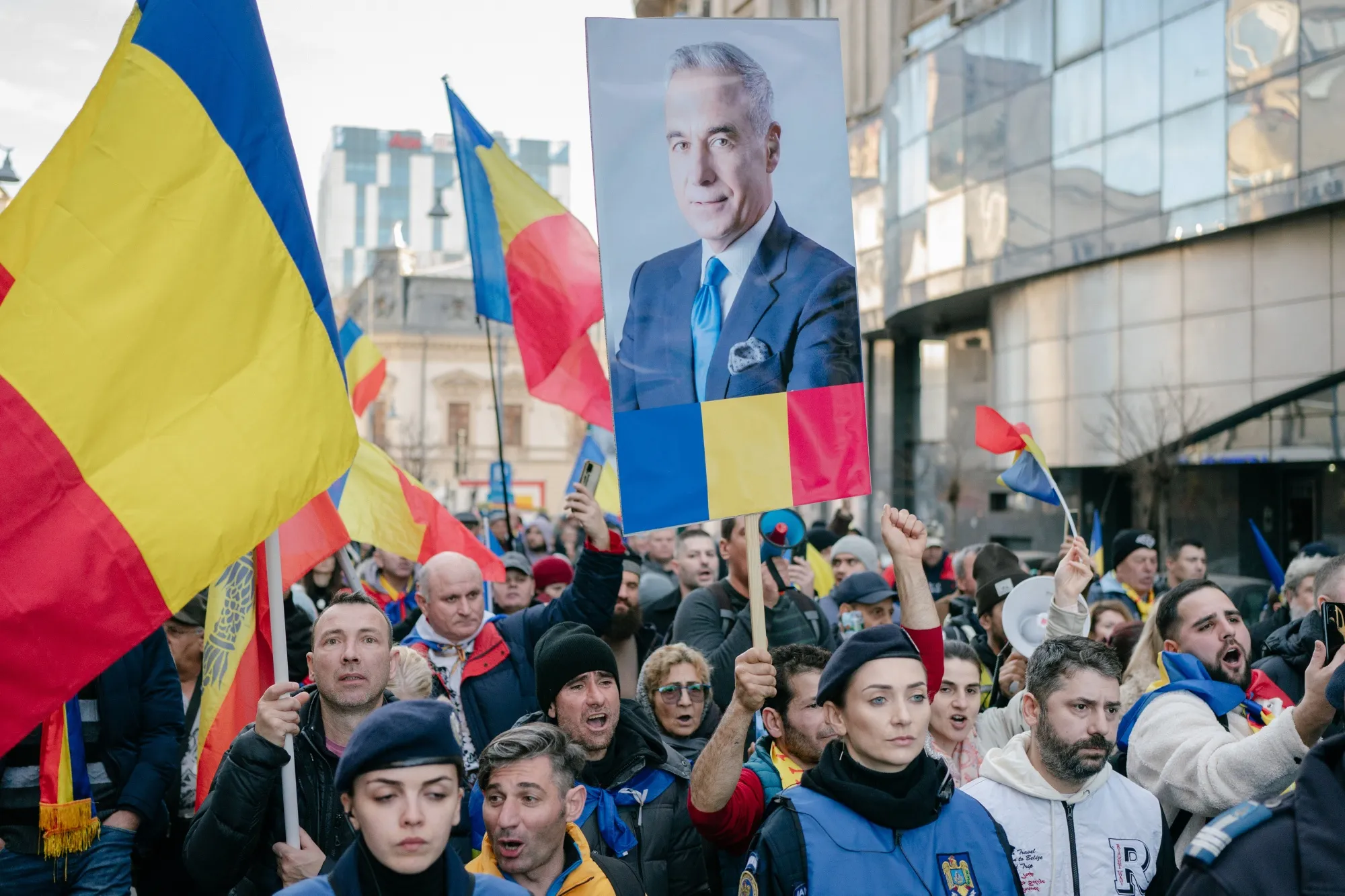 Supporters of Calin Georgescu protest to reverse the constitutional court ruling cancelling the presidential ballot in Bucharest, on Jan. 10.