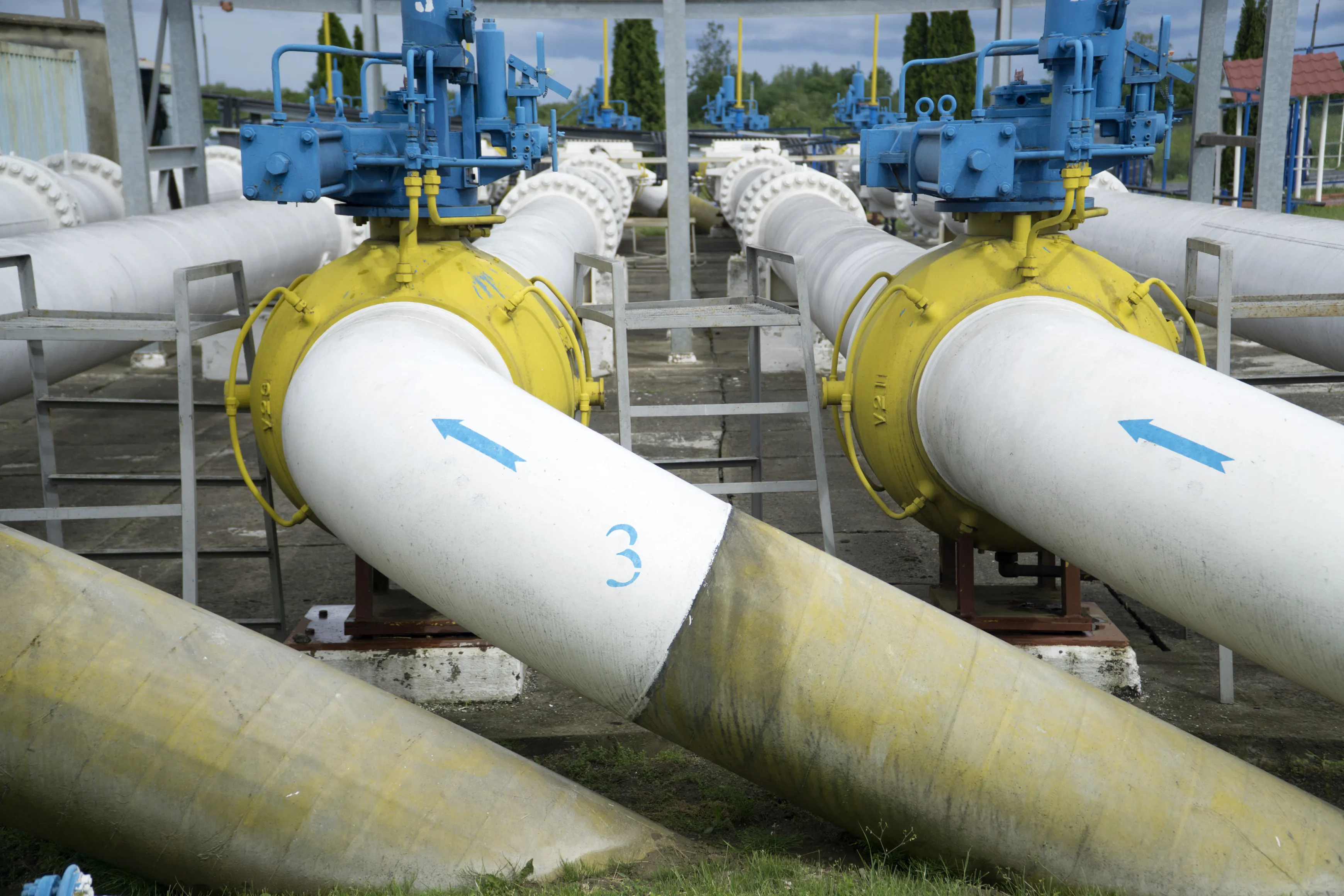 Flow direction arrows sit on trunk pipes at the gas metering station&nbsp;in Uzhgorod, Ukraine.