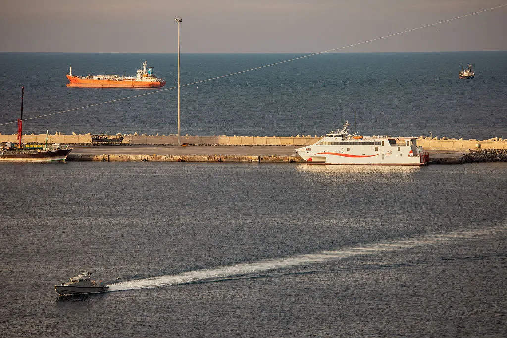 Oil tankers and high speed crafts sit anchored at Muscat Anchorage near the Strait of Hormuz.