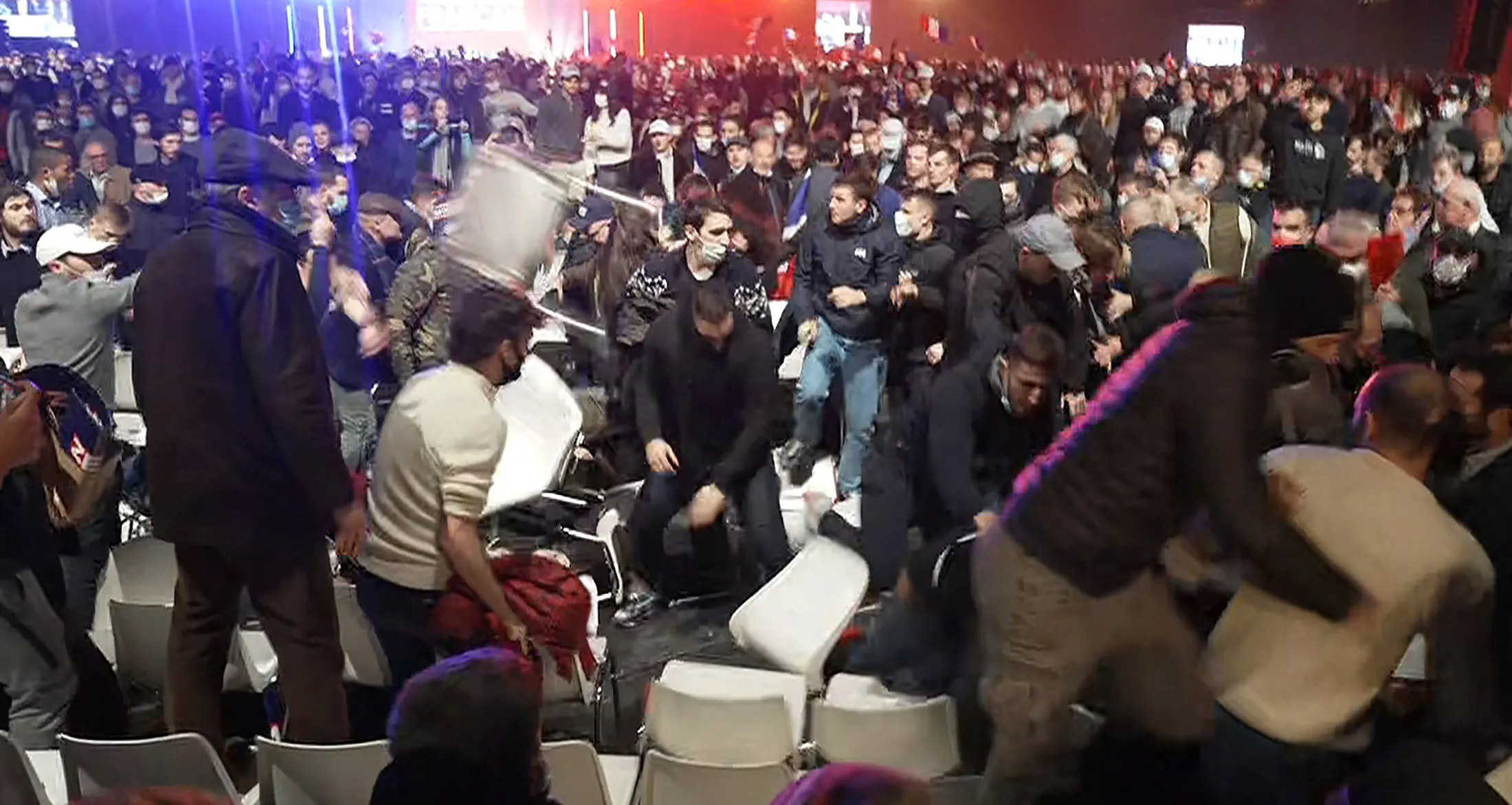 A video grab taken from an AFPTV footage shows a clash during the end of a campaign rally for Eric Zemmour in Villepinte, near Paris, on Dec. 5.