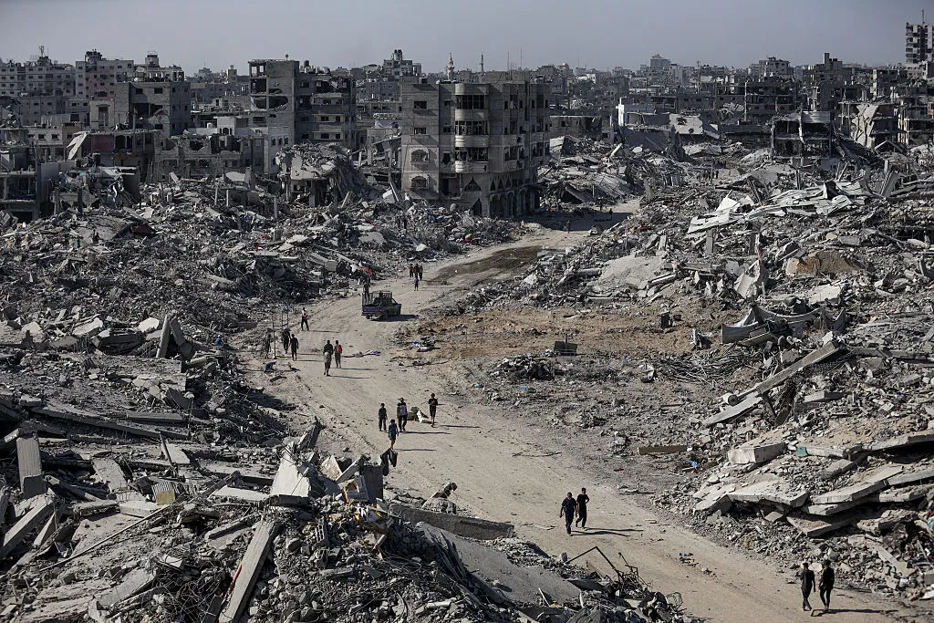 Palestinians continue to return to Sheikh Radwan neighborhood, in Gaza City on Oct. 11.