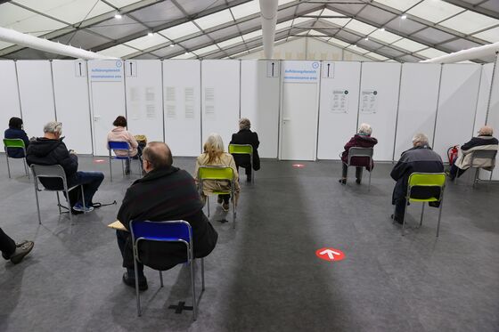 Merkel’s Hand Prints Are All Over Germany’s Vaccine Failings