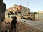 Military vehicles of the UN-backed government forces of Libya clear the way for the ground troops in south of Tripoli, Libya, 