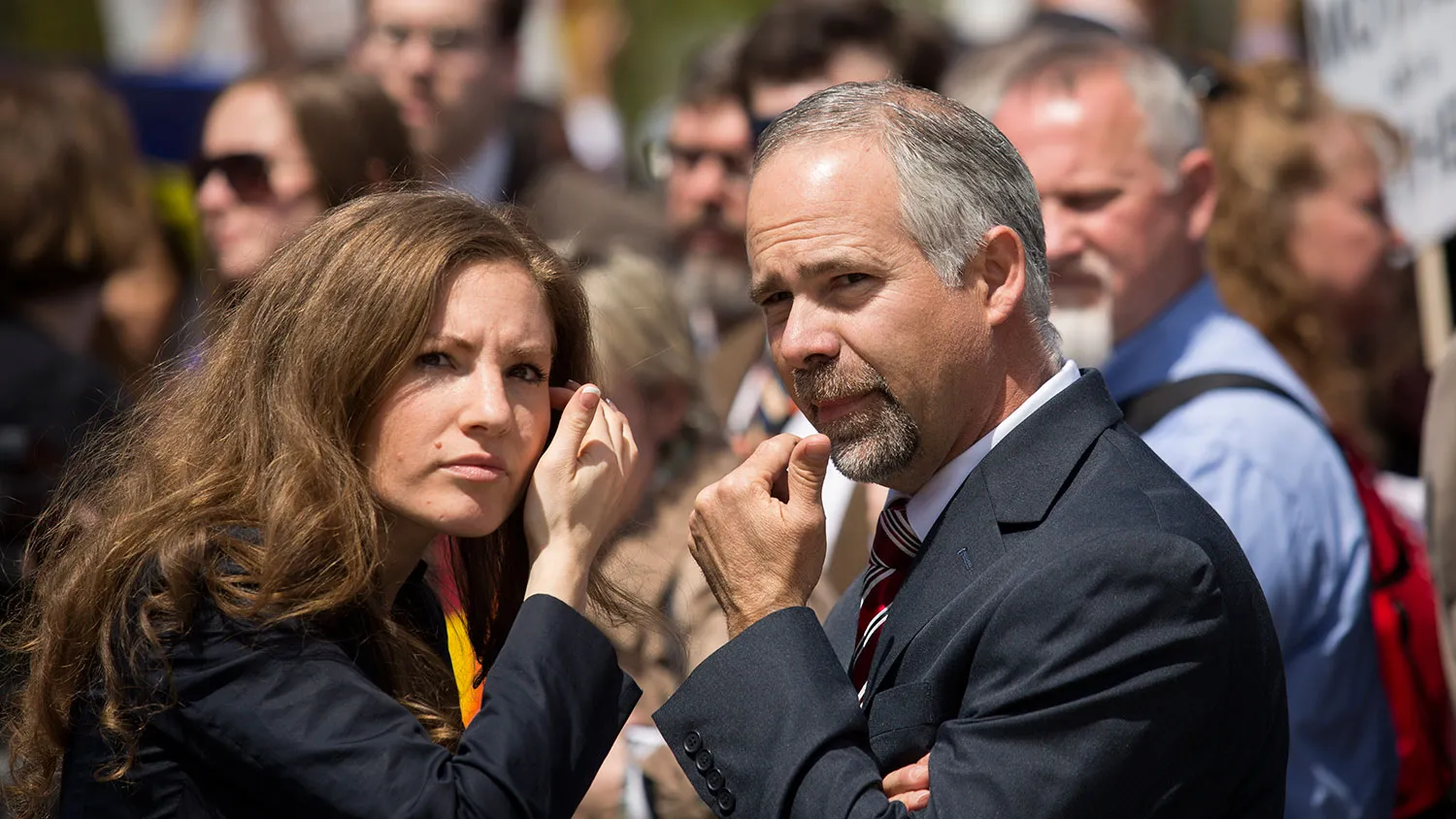 At right, Representative Tim Huelskamp speaks near the Supreme Court on April 28, 2015, in Washington.
