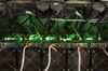 Cryptocurrency mining rigs operate in a cargo container at the Golden Fleece cryptocurrency mining company in Kutaisi, Georgia, on Monday, Jan. 22, 2018. Golden Fleece uses a cargo container with Chinese-built computers inside a dilapidated Soviet-era tractor factory to extract cryptocurrencies using low-cost electricity generated by water flowing from the nearby Caucasus Mountains.