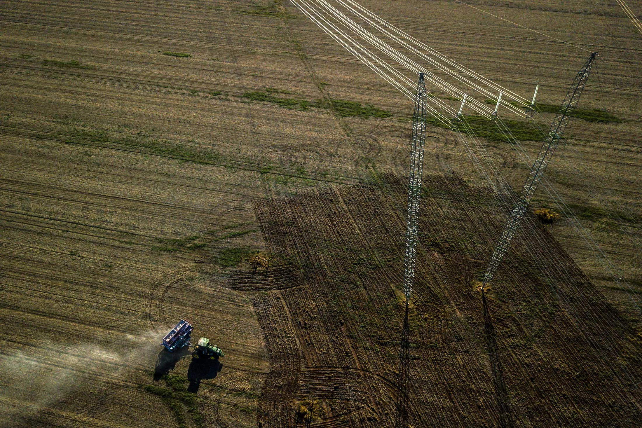 Electricity transmission towers on a corn field in Santa Maria, Bahia state, Brazil, on May 9, 2018.