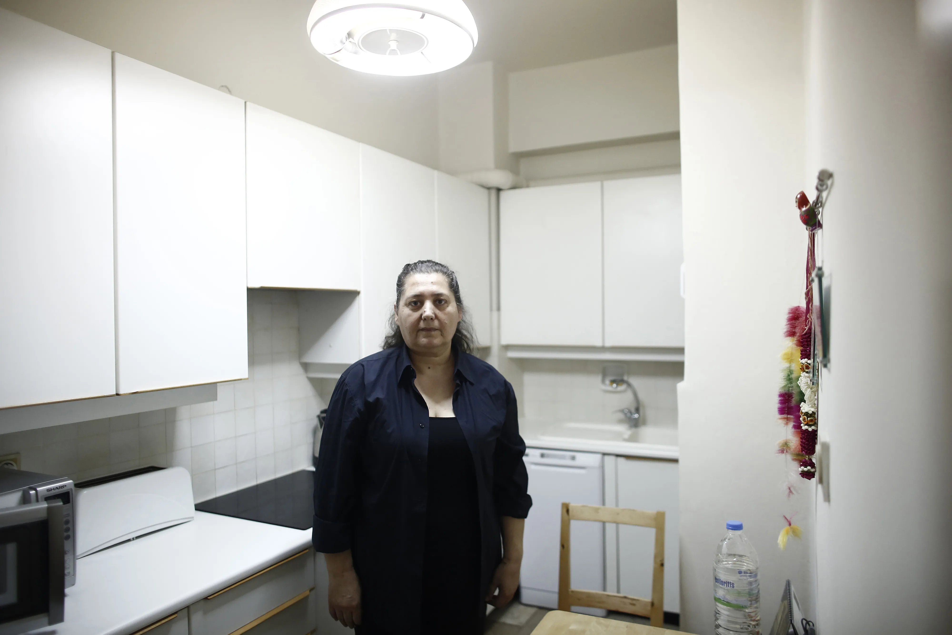 Mother of two Maria Kounani, who opted for early retirement. Photographer: Kostas Tsironis/Bloomberg
