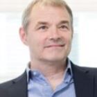 Headshot of Dr Conrad Jason Kingdon