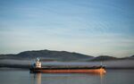 A cargo ship sits moored near the port of Prince Rupert, British Columbia.