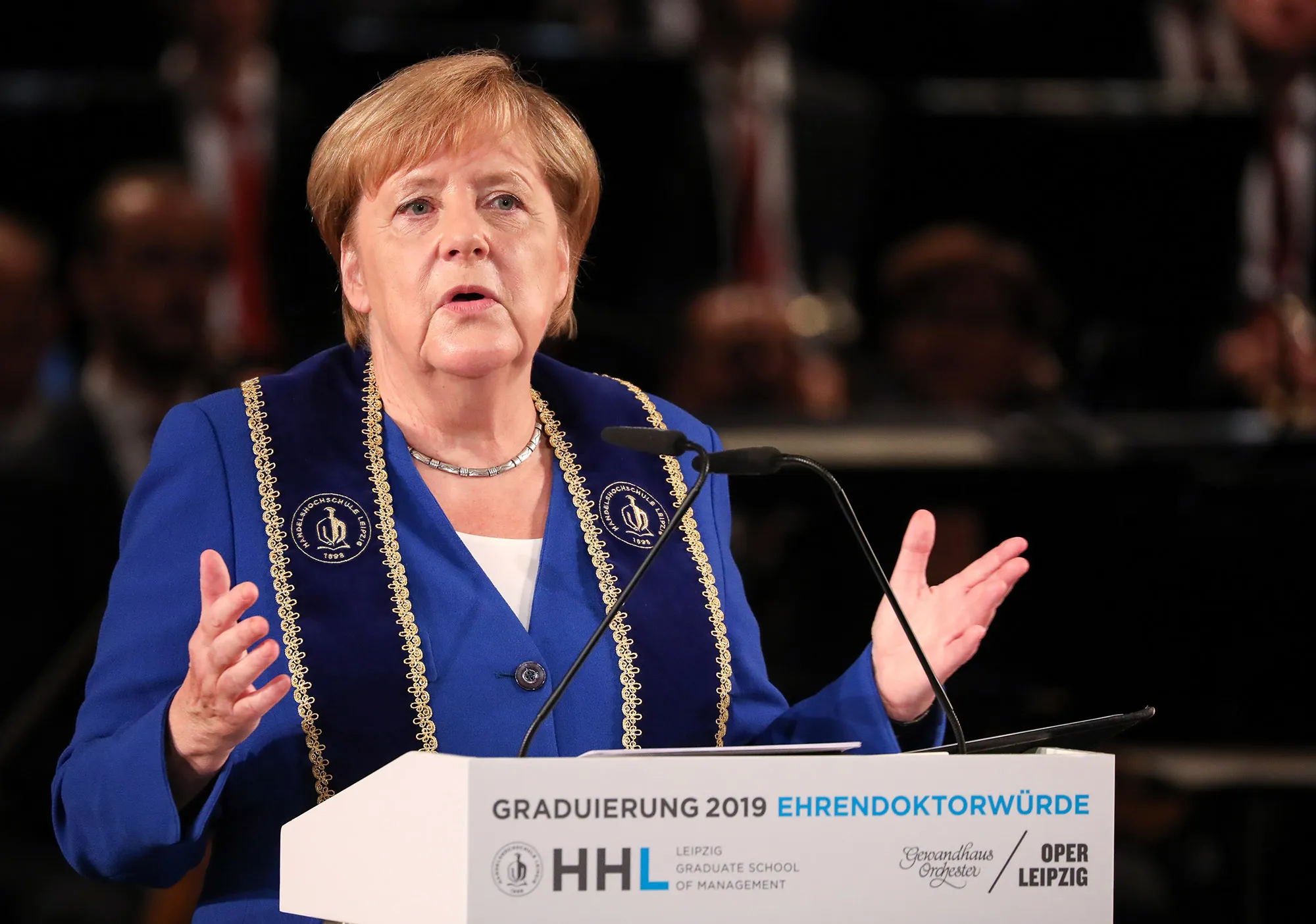 Angela Merkel speaks after receiving an honorary doctorate from the Leipzig Graduate School of Management (HHL), Aug. 31.