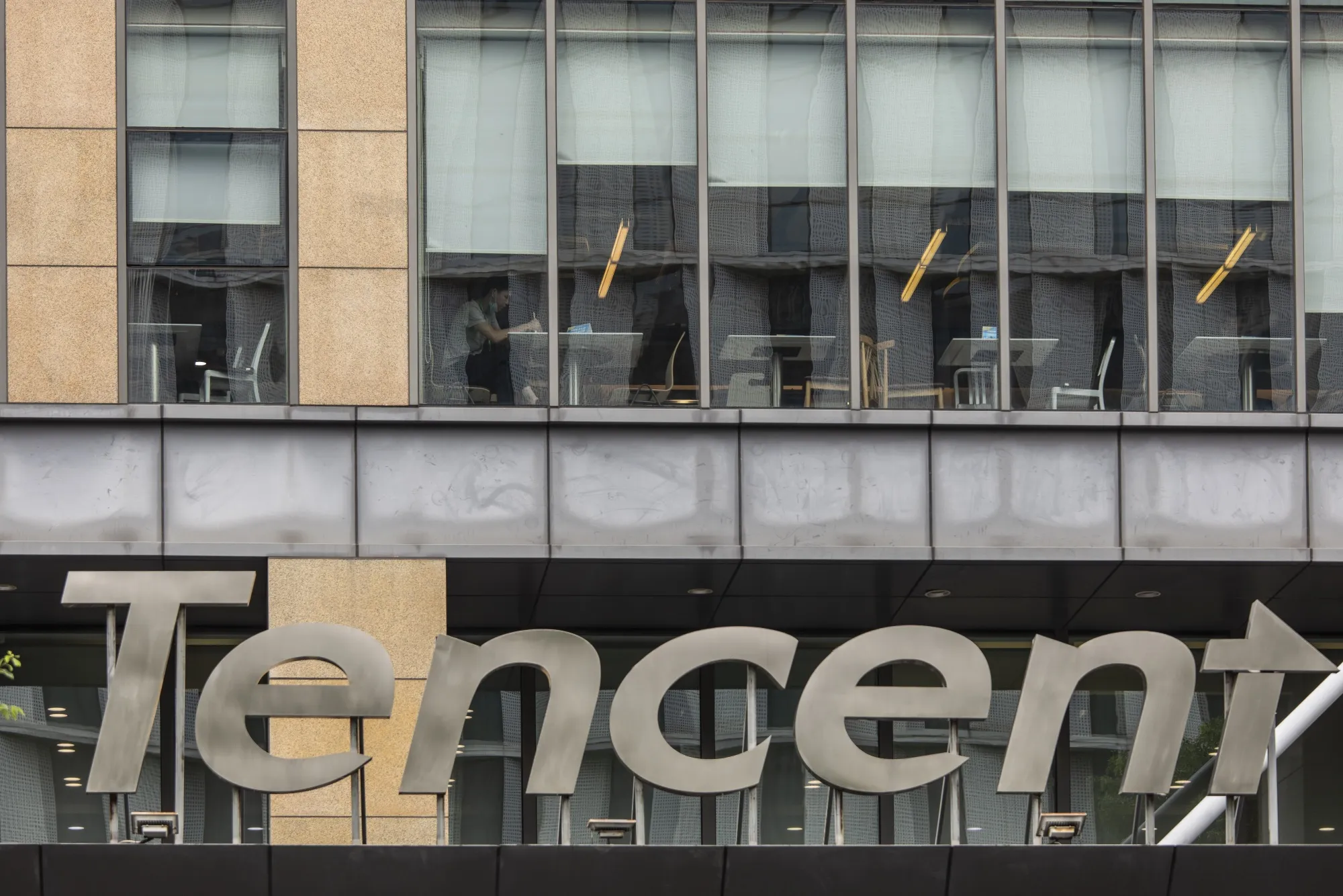 Signage for Tencent Technologies Inc. outside one of the company's office buildings in Shanghai, China, on Monday, Aug. 16, 2021.&nbsp;
