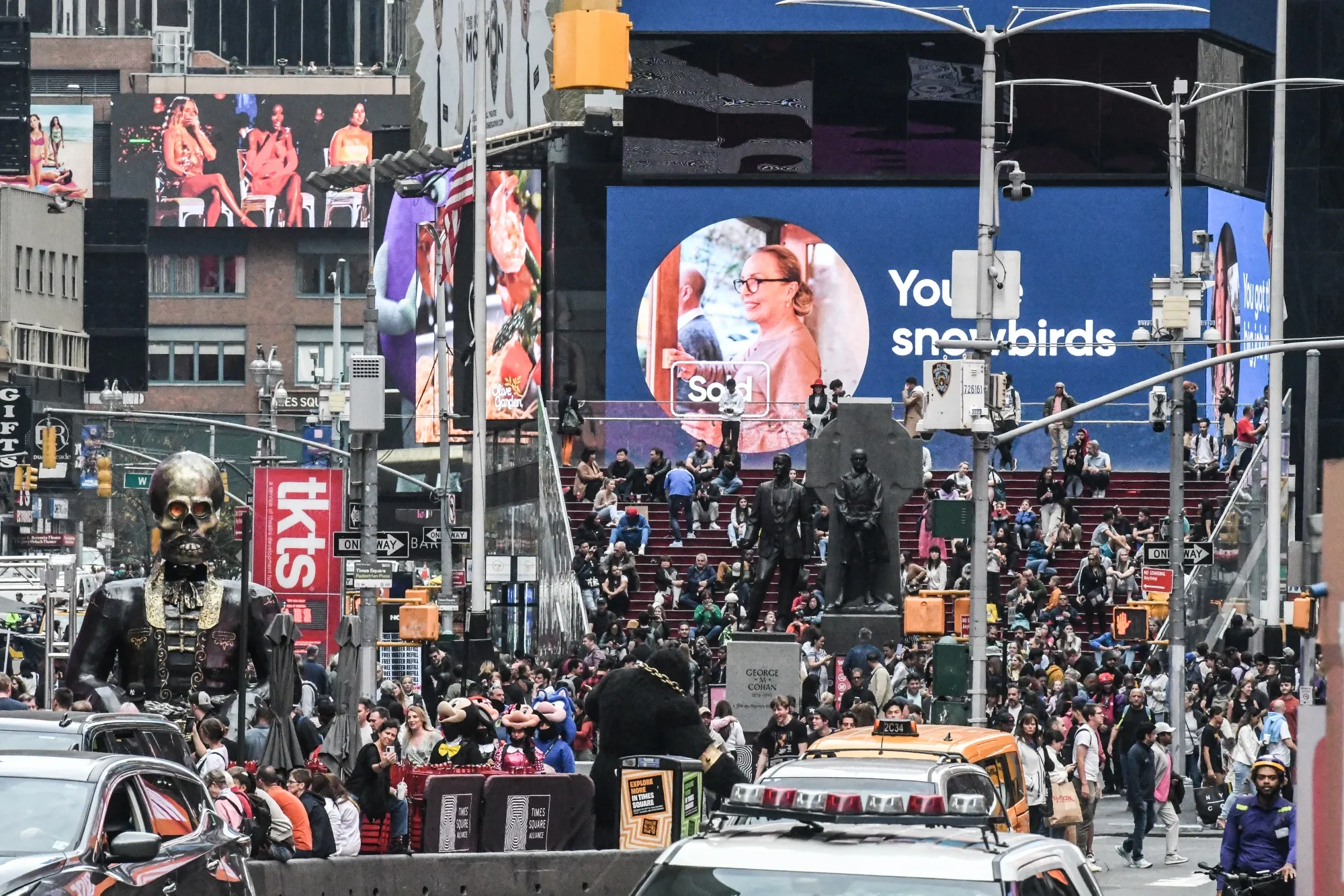 Pedestrians and shoppers in the Times Square neighborhood of New York.