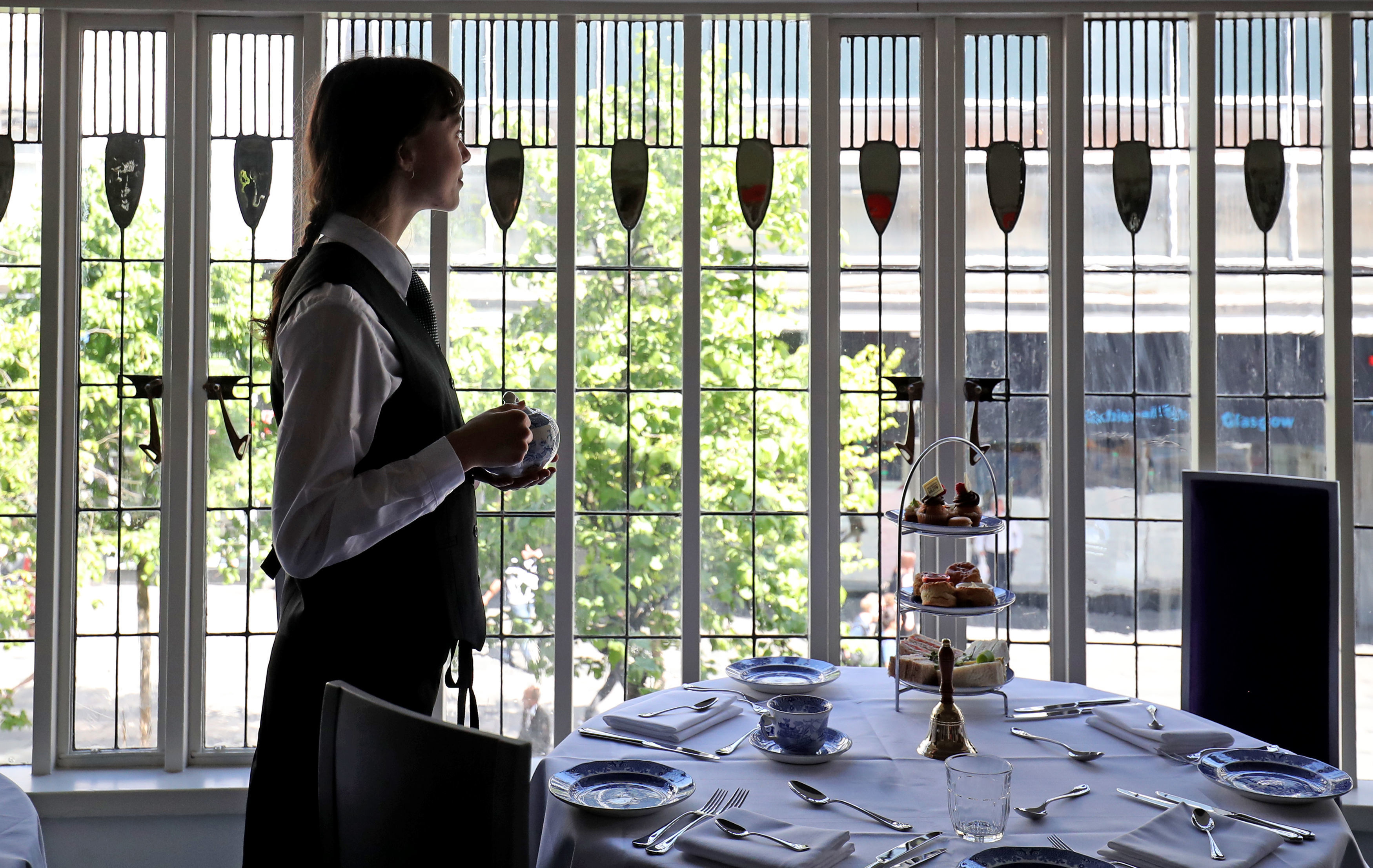 New teasmith Holly Murphy on her first day at the upgraded restaurant, Mackintosh at the Willow, at the original Willow Tea Rooms building in Glasgow, on the 150th anniversary of the birth of designer Charles Rennie Mackintosh, after Â£10 million restoration project. (Photo by Jane Barlow/PA Images via Getty Images) Photographer: Jane Barlow - PA Images/PA Images
