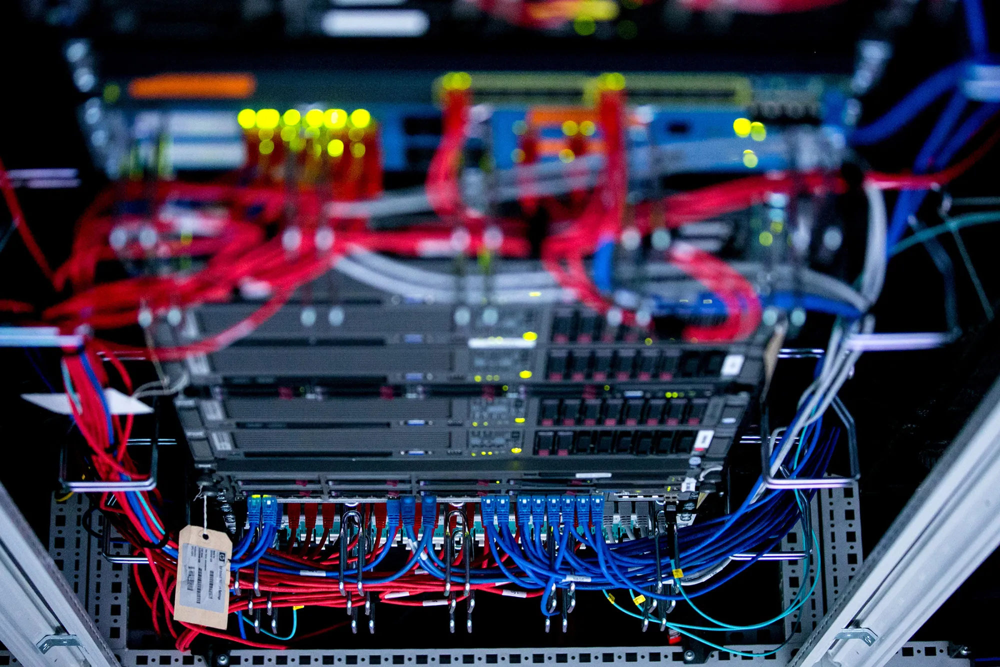 Cables run into the back of a server unit inside the data center of FinTech Group AG's campus offices in Frankfurt, Germany, on Tuesday, April 12, 2016. The volume of investment in Germany's fintech industry will probably quadruple to 2 billion euros ($2.2 billion) in the next five years, said Hubertus Vaeth, managing director of Frankfurt Main Finance.