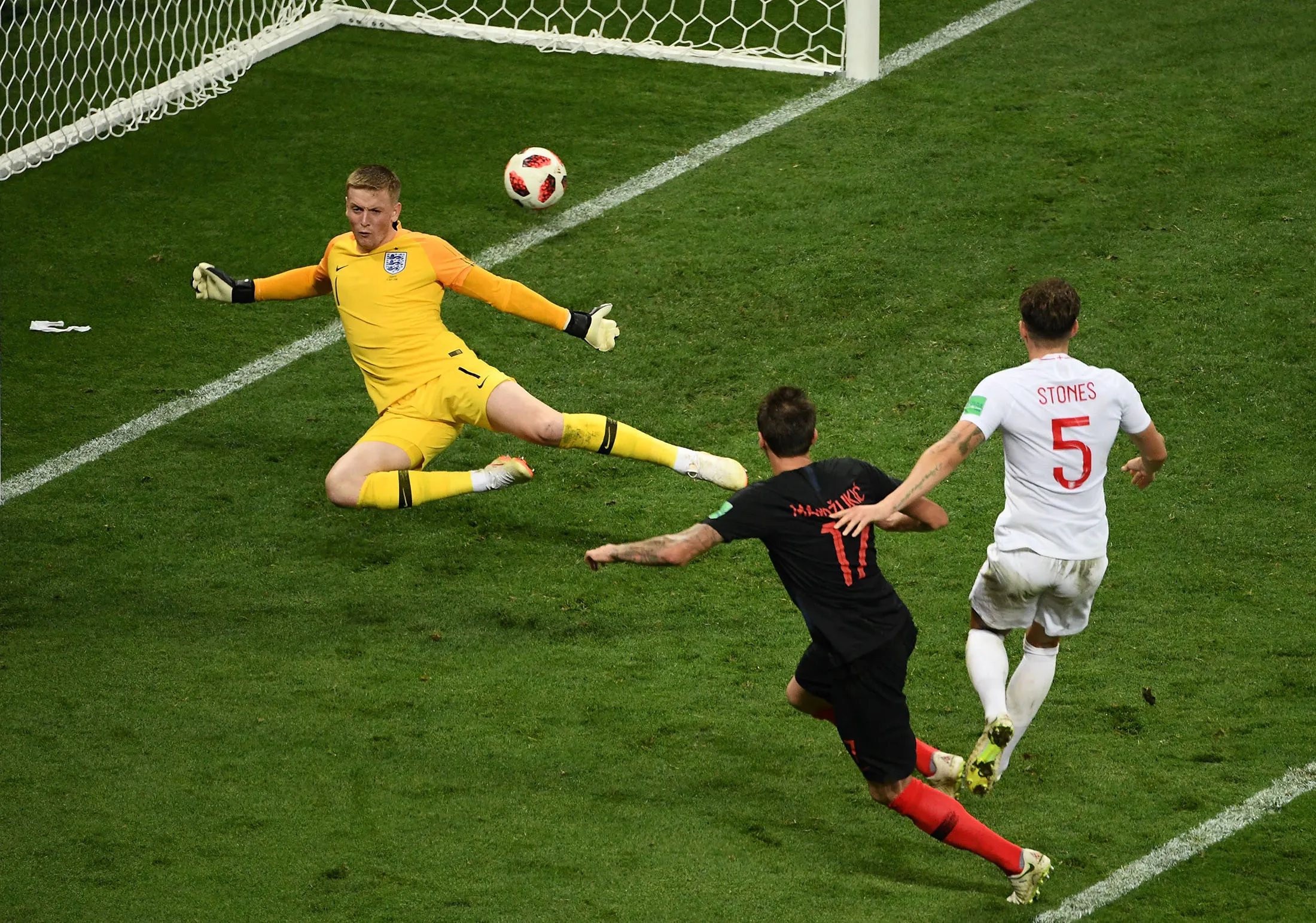 Croatia's Mario Mandzukic scores his team's second goal against England on July 11.