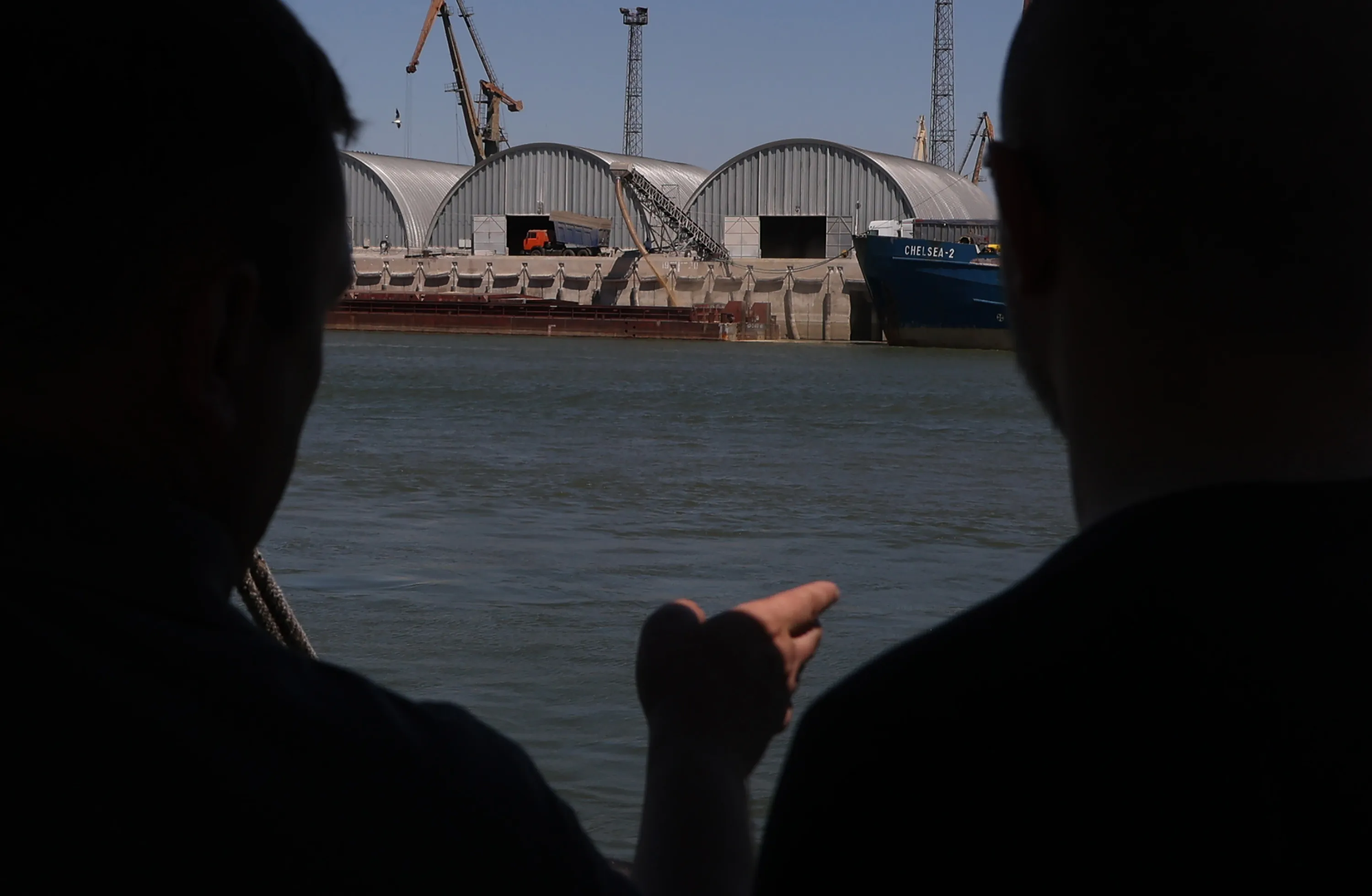 Grain is loaded on to a barge at Reniriver port on the Danube river, Odesa, Ukraine, on July 21.&nbsp;