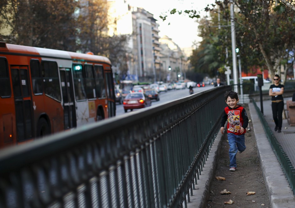 A child plays in Santiago, Chile. 