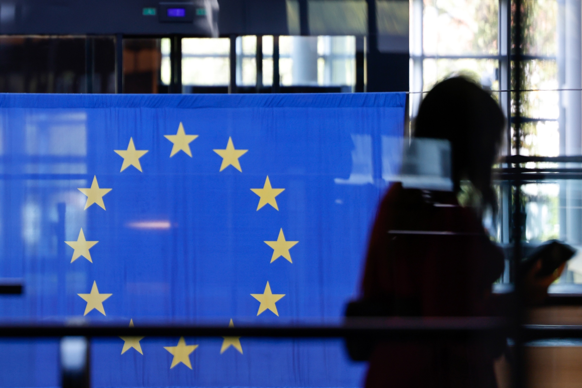 The European Union (EU) flag at the European Parliament's Louise Weiss building in Strasbourg, France, on Tuesday, Sept. 12, 2023. European Commission President Ursula von der Leyen will deliver the State of the EU speech on Wednesday. Photographer: Stefan Wermuth/Bloomberg