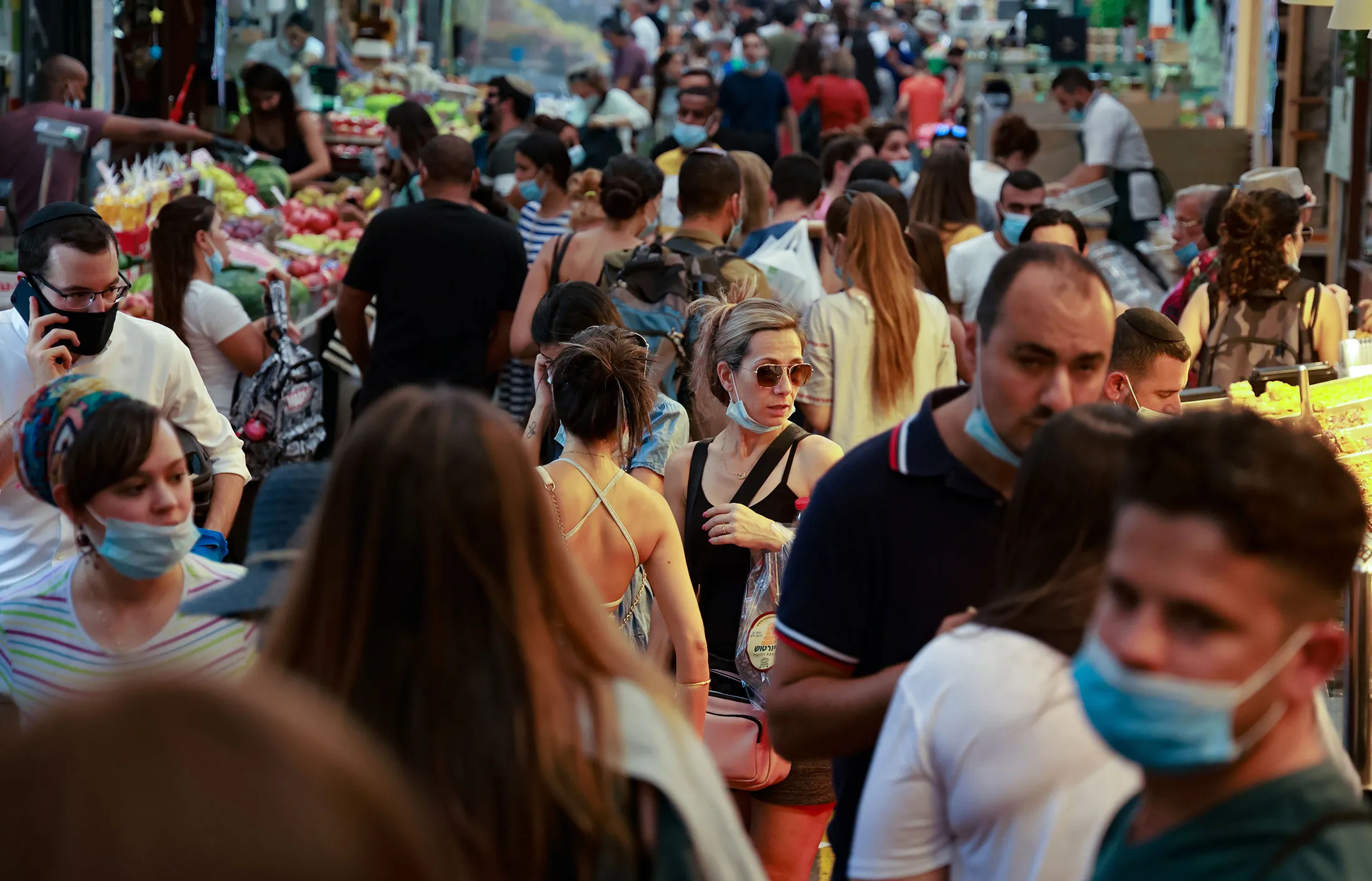 Shoppers crowd an alley of Jerusalem's main market on Sept.&nbsp;11.