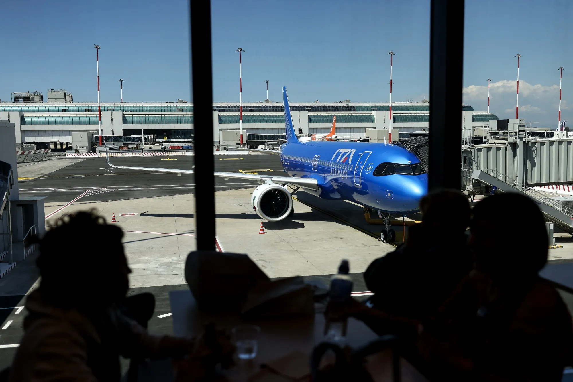 An ITA Airways passenger jet at Fiumicino airport in Rome.